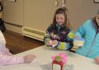 Lois Chesley and her Granddaughters Morgan and Danika Yaeger. Great Granddaughters of Emma Satran taking part at the Clearbrook Good Samaritan Center.
