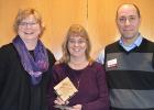 Minnesota 4-H Educators Karyn Santl (left) and Joshua Kukowski (right) present Sharon Weiss, Red Lake 4-H Program Coordinator (middle) with the Minnesota Afterschool Champion Award).