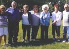 Seven members of the Gulbranson Family from left to right: Alice Cassibo, Robert Gulbranson, Sandy Dombeck, Tammye Cleveland, Donna Solberg, Sharon Lang and Richard Gulbranson attending the flag dedication.
