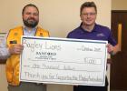 Pictured in the photo are (l-r): David Galloway, Bagley Lions Club treasurer and Cole Young, development officer at Sanford Health Foundation.