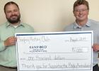 Shown are (l-r): David Galloway, Bagley Rotary Club Treasurer, and Cole Young, Development Officer at Sanford Health Foundation.