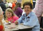 Everyone’s favorite Grandma, Dorothy Sandberg sat with Ella Strom during Bingo for Books last Monday night at WEM School.