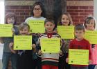October Elementary Students of the Month. Front row left to right: Paige Tollefson, Wyatt Abel, Malea Mathson; Back: Aden DeSchane, Nicole Kingbird, Daisy Java, Tyler Mathson; Not Pictured: Vernelle Kingbird-Spears
