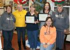 Pictured from left: Phyllis Neuschwander (Grygla) (Area Coordinator), Nancy Campbell (Clearbrook) (VP of Home at Heart), Sheila Bouffleur (Mentor) (Employee of the Year), Elizabeth Agnes (Fosston) (Employee of the Year), Roberta Otting, (Bagley) (Home at Heart RN), Sitting is Olivia Small, (Crookston) (Area Coordinator).