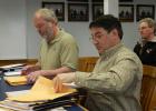Engineer Dan Sauvé and Pat Halloran, left, Assistant Engineer, opened and announced the bids for four projects in the County. They will be awarded next week.