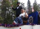 Mike & Jennifer Phaller (Abe Lincoln & Betsy Ross) wave at the crowd at the Debs Parade.