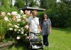 Betty with her daughter Cheryl stand by the spectacular hydrangeas that grace Betty's yard. "These are my favorite flowers!" 