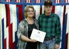 Paul Carlson with his wife, Donna Rae with the Quilt of Valor that was presented to Paul for his military service.