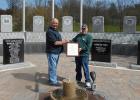Donovan Bierbaum received a 50 year member certificate from Lloyd Engen. 