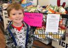 Hunter Hackley helped shop and donate to the Grygla-Gatzke Food Shelf on behalf of the Grygla-Gatzke Jaycee’s Club.