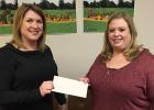 Tracy Imle with Early Childhood Initiative, ECI, presented a $15,000 check to Clearbrook City Clerk Lucie Thompson for the new project around the city pool and Clearbrook Depot.