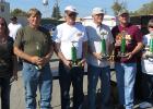 Winners selected by the car show participants received $100 each. No entry fee is required. From left to right: Stacy Halvorson, Les Berg, Gully; Rick Myrum, Pengilly; Bob Prosser, Hallock; Brant Melbo, Bagley and Mary Gustafson, East Grand Forks and Pine Lake. 
