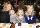 Kaili Fawver with her three girls at the Muffins for Moms at the Clearbrook-Gonvick School. From left: Hadley, Lainey and Emma.