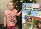 Prize winner at the Northern State Bank in Gonvick was Alice Brenton with a Giant Cardboard Train to color.