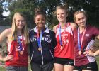 RLCC’S Julia Bernstein (second from left) had an awesome opportunity to compete in track at DownUnder in Brisbane Australia. She and her relay teammates are pictured with their third place medals.
