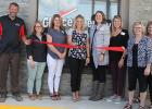 Taking part in the ribbon cutting ceremony at the new Bagley Choice Therapy location were from left to right: Joe Kapaun, Kelsey Buelow, Jodi Soderstrom, Mandy Hoie, Kirsten Landmark, Lean Weller, Cheri Ware and Candi Slethvedt.