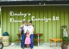 New Owners, Patrick Kruchowski, holding Matthew, Lori Wold and Kinsley Kruchowski. The business is located in the old Cyr Hardware building on the corner of 1st and Main.