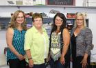 Toni Johnson, Loretta Syrtveit, LeeAnn Smith and Cheryl O'Neill celebrated Loretta's 50th year anniversary with Oklee Quilting Supply, Inc. on July 15.