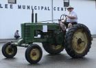 Jared Hofstad, son of Glenn Hofstad of Trail, MN, is driving this 1948 John Deere Model B. Glenn Hofstad picked up this tractor in Drayton, ND at an auction. It has been left in it's "work clothes" on purpose!
