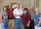 Jim Stordahl was recently honored at a retirement reception at the University of Minnesota Crookston Campus. He is pictured here with his family, (l-r) Wanda Stordahl, David Stordahl, Jim Stordahl, Adler, Roxanne Stordahl, Lawrence DuFault and Madeline DuFault.