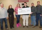Receiving the checks from Enbridge  in Gonvick were from left to right: Mark Larson, District 5 Area County Commissioner; Gonvick Mayor Candace Coulter; Laura Kircher, Enbridge Community Engagement Advisor; Devin Aakre, Gonvick Fire Department; Jason Bakke, Gonvick Fire Department and Gonvick City Council member and Dan Johnson Gonvick Fire Department. 