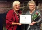 Bonnie Wagner (left), Vice President of NW MN SWO, presents the Mary Magdalene Award to Irene Rosten, the Conference 2 winner.  The award presented at the 30th Annual Convention held at Fair Hills Resort, Detroit Lakes, MN.