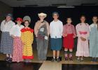 Pictured are the cast members from left to right: Presley Westrum- Mrs. Thatcher; Joely Hinrich-Olson - Mrs. Harper; Tatum Melby - Hildegarde;  Jacob Anderson - Huckleberry Finn; Jack McQuown - Tom Sawyer;  Wyatt Westrum - Sidney; Anna Engebretson - Becky Thatcher and Abby Engen - Suzie Harper.