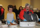 Sarah Lee, Darrell & Sandra Tougas serving at the Oklee Firemen’s Blizzard Bonanza on February 25th.