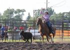 Dani Watne of Gully in the Breakaway roping contest at the Gonvick Lions Rodeo.