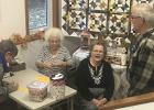 Selling raffle tickets Our Saviors Lutheran Church dinner at Leonard were Donna Solberg and Ardella Lindberg. Violet Hagen of Clearbrook won the quilt. 