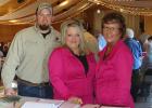 Greeting the guests at the Clearwater-Polk 71st annual meeting were Travis Huot, Angie Swenson and Karen Hopke.