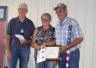  Lewis Family of Shevlin, was the 2018 Beltrami County Farm Family. Presenting the award was Richard Anderson to Cindy and Tim Lewis. - Submitted photo by Eleanor Hall 
