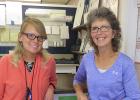 Shown to the left is Brenin Hill, the temporary OIC, Officer In Charge at the Post Office in Gonvick. She is replacing Jackie Ulrich, to the right, who retired on June 29.
