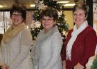 First State Bank employees took time to take this picture, with Mona Djernes, Debbie Pletschett and Niki Groshong. 