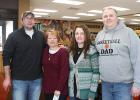 Ross Faldet on the right accepted a $5,000 check in memory of Jim Vordebruggen from family members Josh, Terri and Karla. The money will be used for the car project in the Industrial Technology Class at Clearbrook-Gonvick High School.