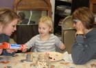 Brittani Nelson-Emmel, Elleigh Nelson-Emmel and Grandma Laura Nelson with the Marvelous Mosaics class.