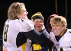 Michael Lindgren, in the middle enjoying the football victory,.