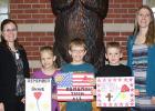 Clearbrook-Gonvick fourth grade winners for the Poppy Poster contest with their teachers Laura Dahl and Chelsey Ehlers. L-R. Dahl, First place winner Abby Engen, 2nd place winner Ben Goudge, 3rd place winner Nathan Weems and Ehlers.