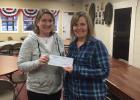 Joy Walberg, (on the left) representing the Clearbrook Community Club giving Sandy Gray, representing the Clearbrook-Gonvick After Prom committee a check. The Community Club donated to the 2016 Clearbrook-Gonvick After Prom party that will be held April 16.
