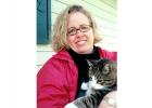 Karen Busch, Owner of Paws Hoofs Claws.