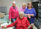 The ladies who volunteer for McIntosh Heritage and Arts Center. Cutting articles, collecting items and maintaining the Center. Pictured are: Donna Larson, Judi Lindseth, Arlene Eggers, and Toni Epema.