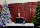 Andrea Neeland (keyboards) played on as shoppers rush home with their….. wait wait as the shoppers rushed in to taste treasures!

