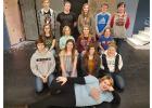 Lying down is Dede Walton, Officer O’Hara. Front row (l to r): Jayden Iverson, Officer Klein; Sydney Melby, Abby Brewster; Jade Person, Dr. Einstein; Hannah Kolstoe, Martha Brewster. Middle Row (l to r):  Kara Longtin,  Elaine Harper; Remy Ransack, Mr. Witherspoon; Natalie Aakhus, Teddy, Brewster; Heather Longtin, Lieutenant Rooney. Back row (l to r): Tom Nelson, Mortimer Brewster; Nick Pahlen, Jonathan Brewster; Tera Qualley, Officer Brophey; Britain Arl, Rev. Dr. Harper; Abby Walton, Mr. Gibbs.