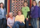 Pictured are Dee Dee Natum, Vicki Strom, Kathryn Carver, Lois Boehrnsen, Deb Reierson and Sue Vennes. Not pictured: Sandy Salvhus, Amy Brinkman and Liz Jenson who also were part of the group that spent the day sewing.