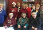 People standing left to right - Arlene Eggers, Kathy Finstad, Ilene Reierson, Deb Winjum, Betty Tangen,, Lois Boehrnsen, Connie Strom, Val Brekke. Sitting are Ruth Bartz, Oralee Bailey, and Ellen Burslie.