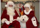 Bentley visits with Santa and Mrs. Claus last year.