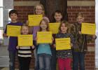 March Elementary Students of the Month: Pictured in back:  John DeVries, Sarah Reichert, Landon Gazelka, Jadelyn Erickson Pictured in front: Lainey Fawver, Molly Gerlofs, Mysten Dahlke.
