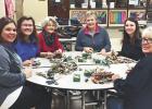 The Grygla School has been coordinating a variety of community education classes. A Christmas crafting night was held, along with a Christmas cookie baking class. Pictured is Jaclyn Moe, Sierra Mickelson, Judy Miller, Colette Brobst, Sadie Olson and Denise Olson making holiday garlands. Upcoming classes include Facebook & Smartphone 101 and a beginner’s quilting class.