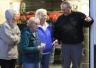 At the fire station open house last week, Doris Cleven, Betty Ostby and DeeDee Moe had a chance to visit with Fire Chief Bob Thompson as the firemen were demonstrating a vehicle extrication procedure. See next photo.