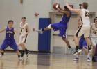 Moses Jensen with the steal for the Chargers in last week’s game against Warroad. He had 3 points/2 steals in the varsity game. Photo by Grygla Eagle Newspaper